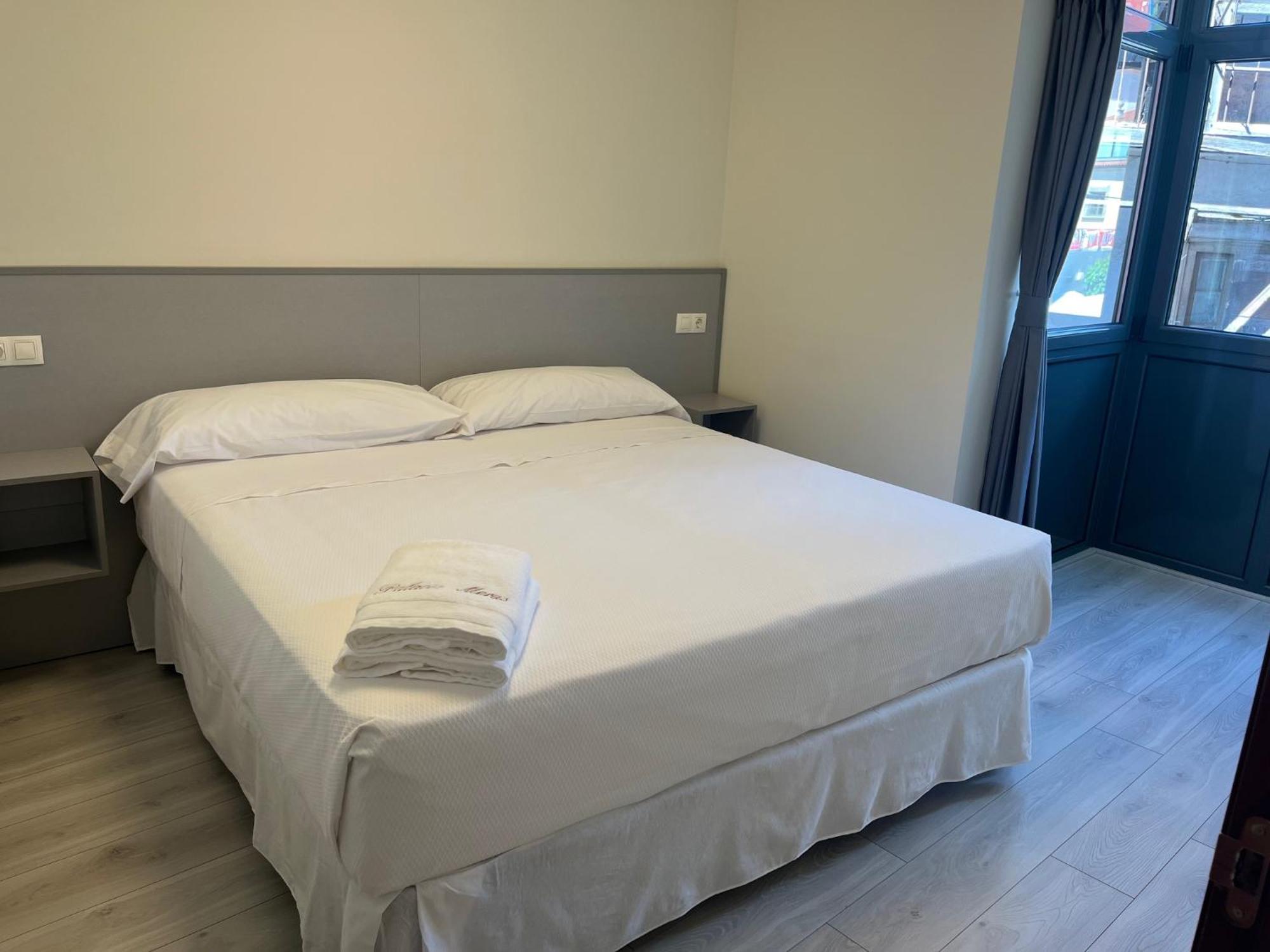 Apartamentos Turisticos Palacio De Meras ティネオ エクステリア 写真